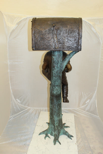 Boy Sitting by a Mailbox reading a book Bronze Statue -  16"L x 20"W x 50"H. 