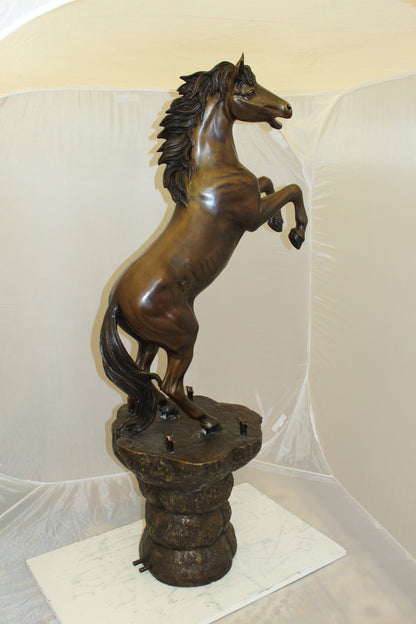 Horse on a Rock Fountain Bronze Statue -  Size: 20"L x 18"W x 56"H. 