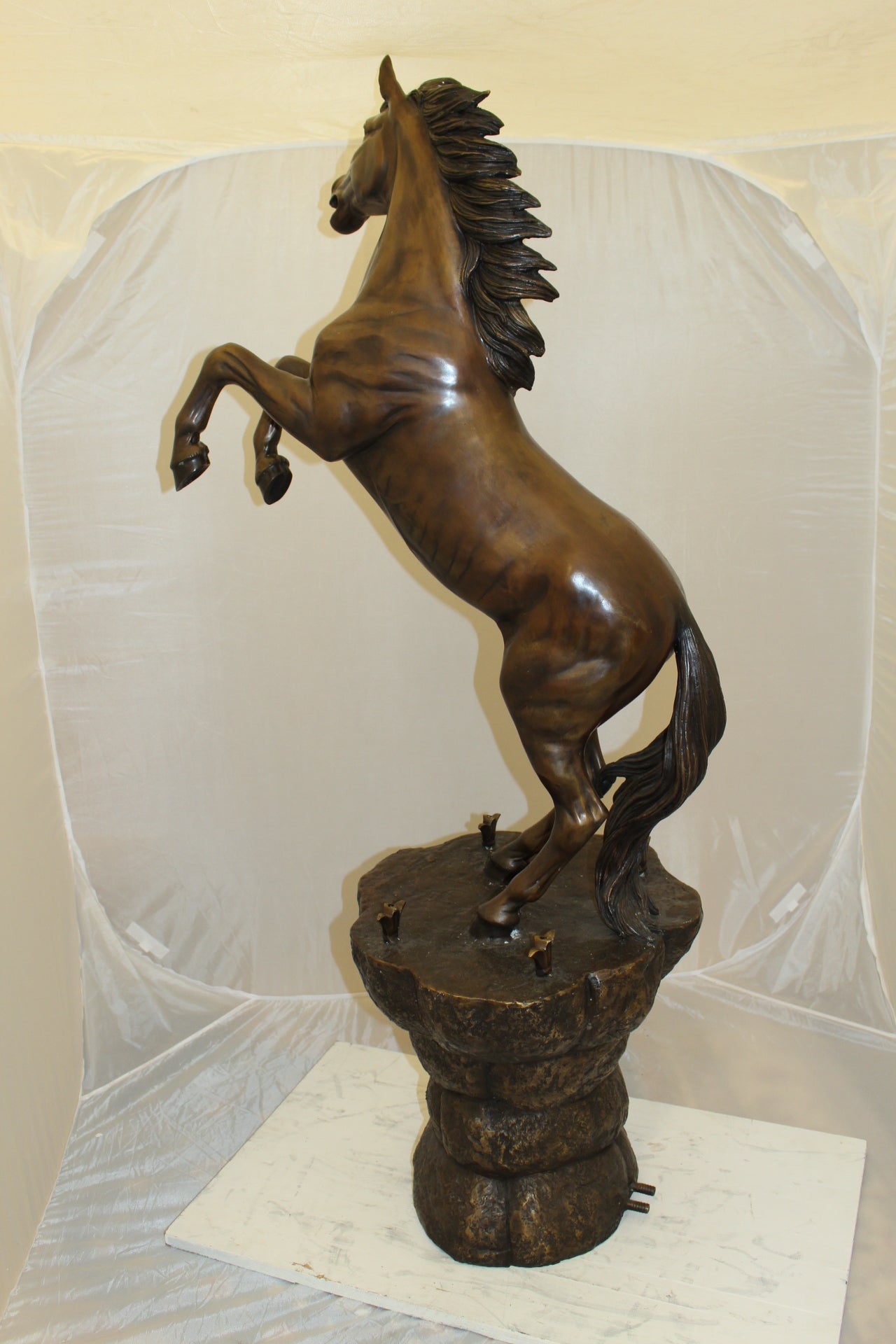 Horse on a Rock Fountain Bronze Statue -  Size: 20"L x 18"W x 56"H. 