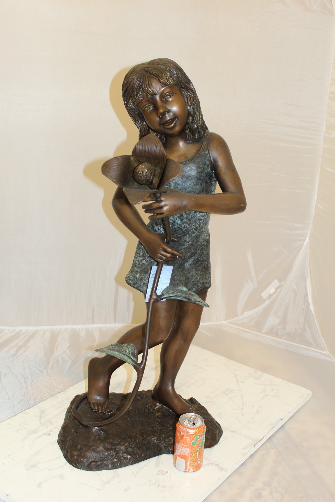 Girl Holding a Flower Fountain Bronze Statue -  Size: 15"L x 15"W x 35"H. 