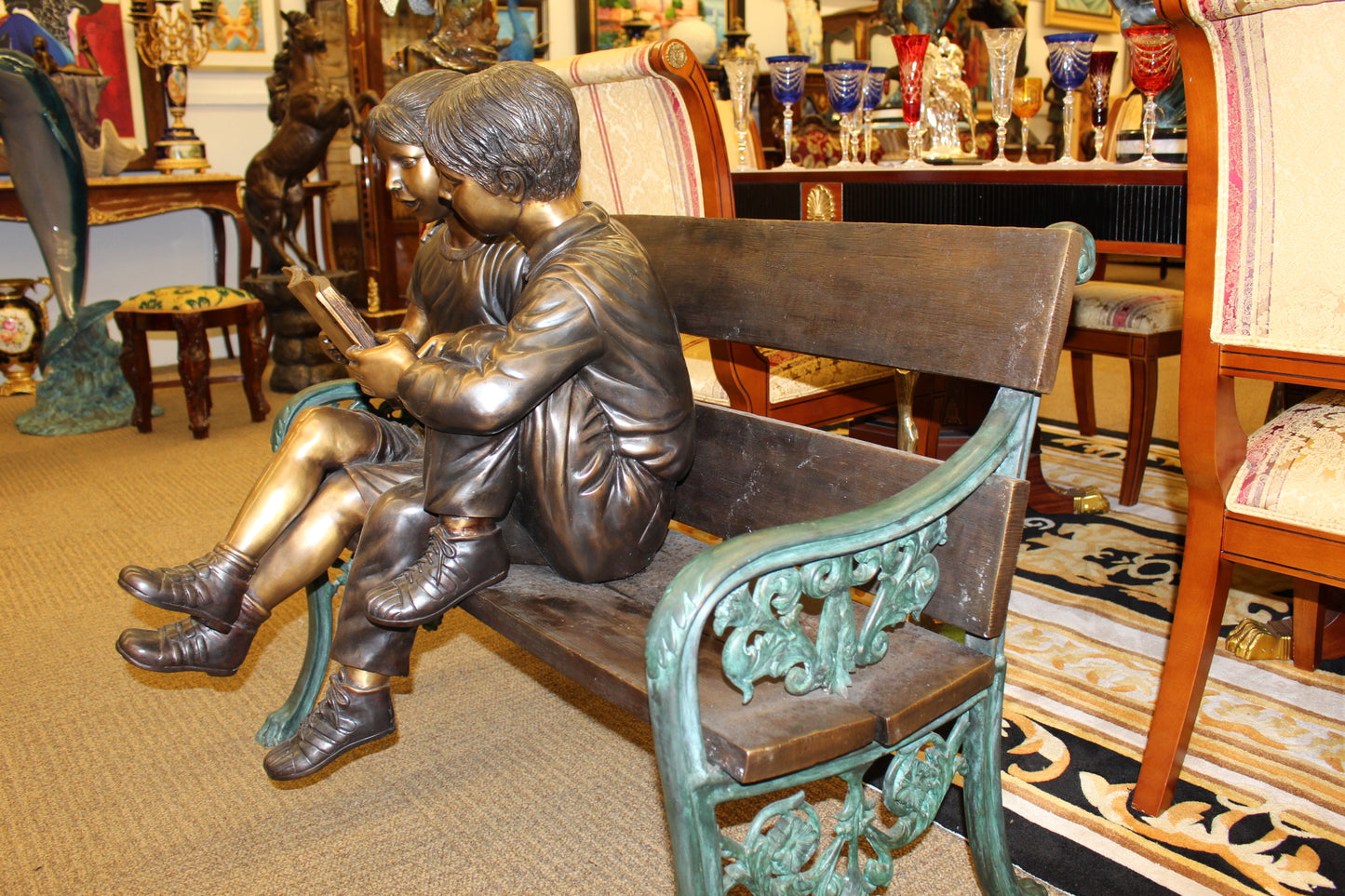 Kids Reading a Book on a Bench Bronze Statue -  Size: 23"L x 38"W x 37"H. 