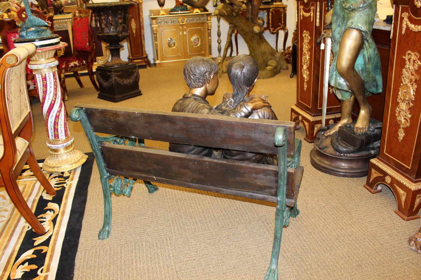 Kids Reading a Book on a Bench Bronze Statue -  Size: 23"L x 38"W x 37"H. 
