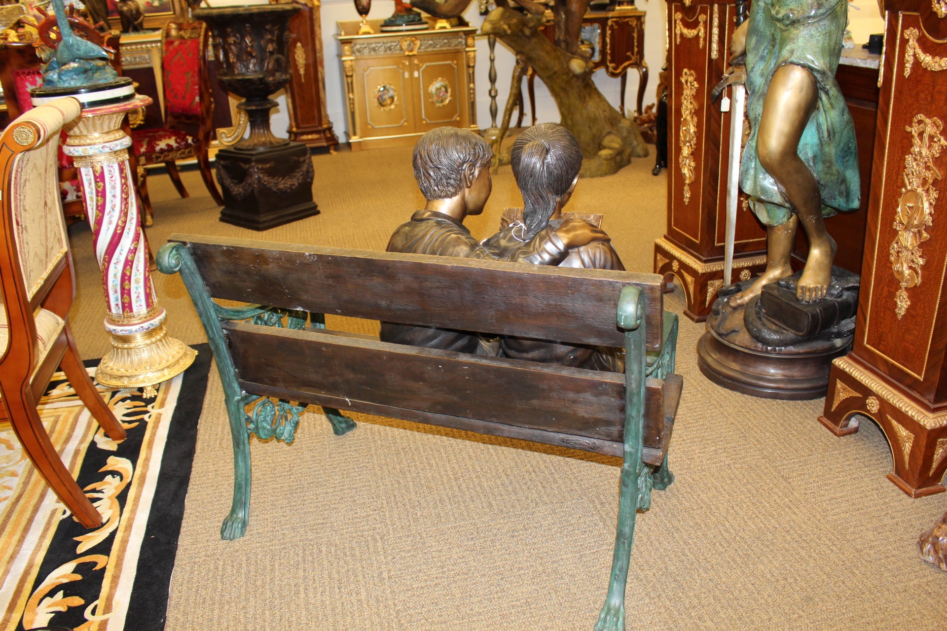 Kids Reading a Book on a Bench Bronze Statue -  Size: 23"L x 38"W x 37"H. 