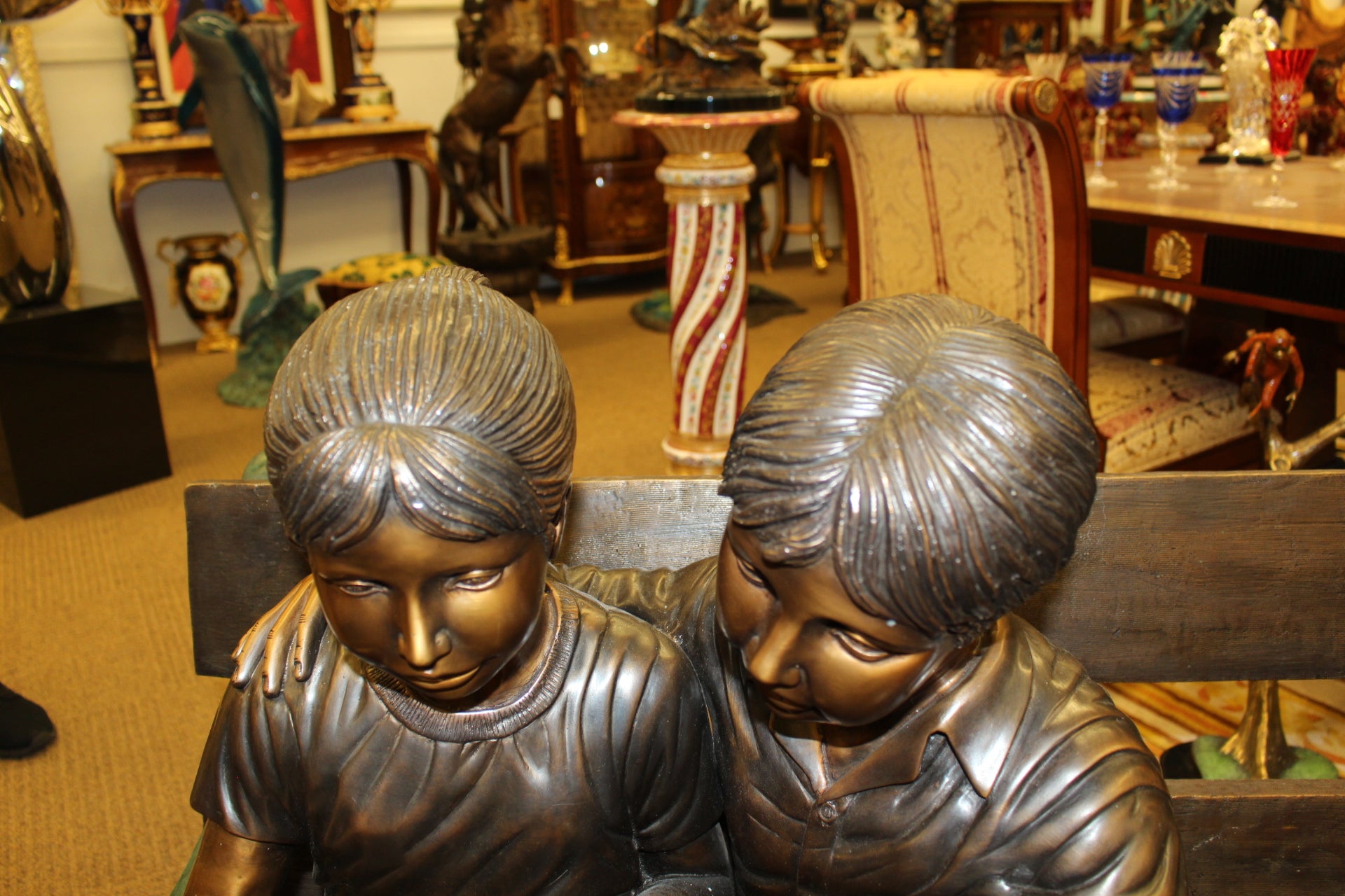 Kids Reading a Book on a Bench Bronze Statue -  Size: 23"L x 38"W x 37"H. 