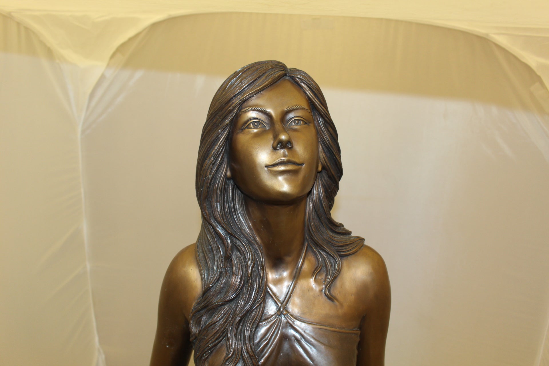 Lady holding her Skirt Bronze Statue -  Size: 32"L x 17"W x 53"H. 