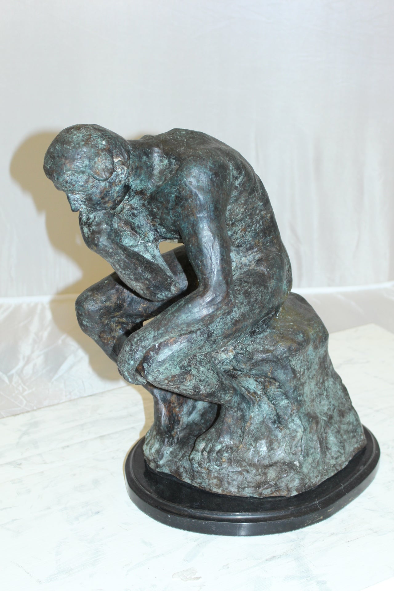 The Thinker Bronze Statue -  Size: 10"L x 12"W x 17"H. 