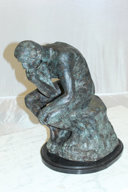 The Thinker Bronze Statue -  Size: 10"L x 12"W x 17"H. 