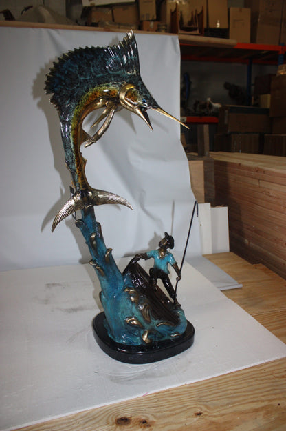 Old man on boat Or fishing man -  Size: 16"L x 12"W x 40"H. 