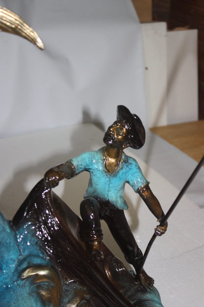 Old man on boat Or fishing man -  Size: 16"L x 12"W x 40"H. 
