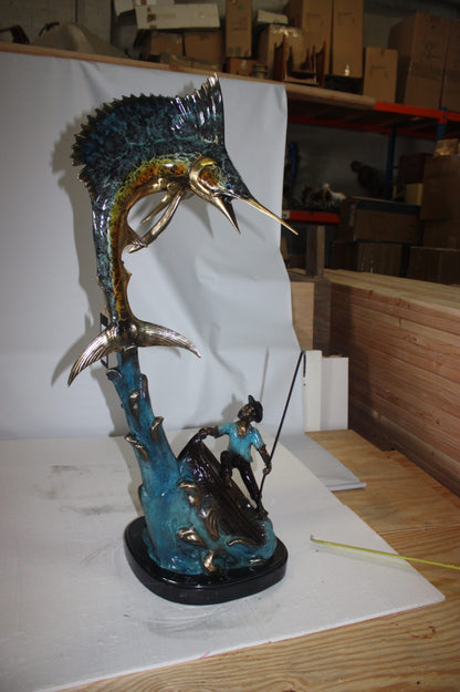 Old man on boat Or fishing man -  Size: 16"L x 12"W x 40"H. 