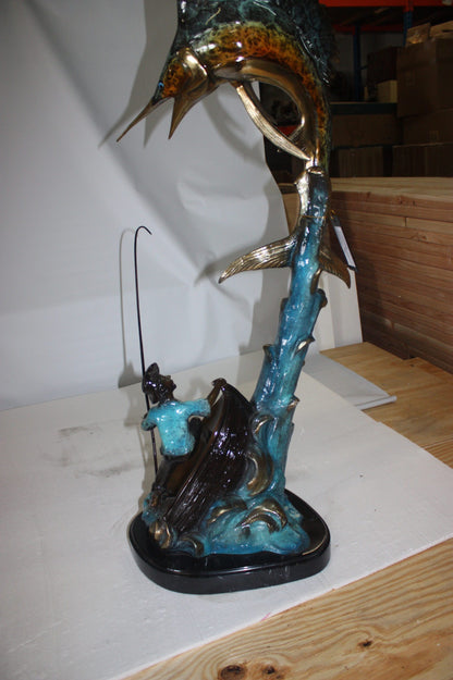 Old man on boat Or fishing man -  Size: 16"L x 12"W x 40"H. 