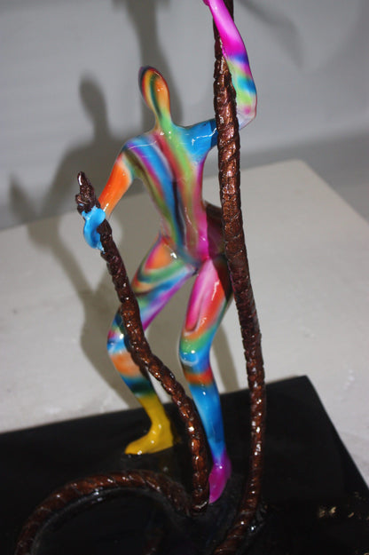 Two boys made of Bronze climbing on rope -  Size: 14"L x 14"W x 39"H. 