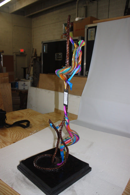 Two boys made of Bronze climbing on rope -  Size: 14"L x 14"W x 39"H. 