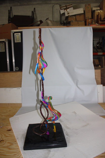 Two boys made of Bronze climbing on rope -  Size: 14"L x 14"W x 39"H. 