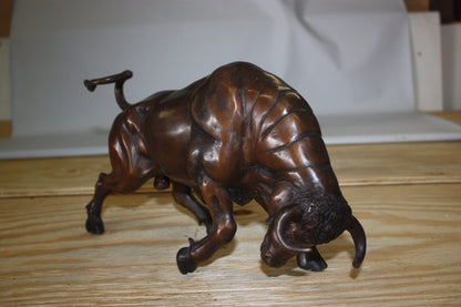 Wall street bull - small, Bronze Statue -  Size: 15"L x 4"W x 10"H. 
