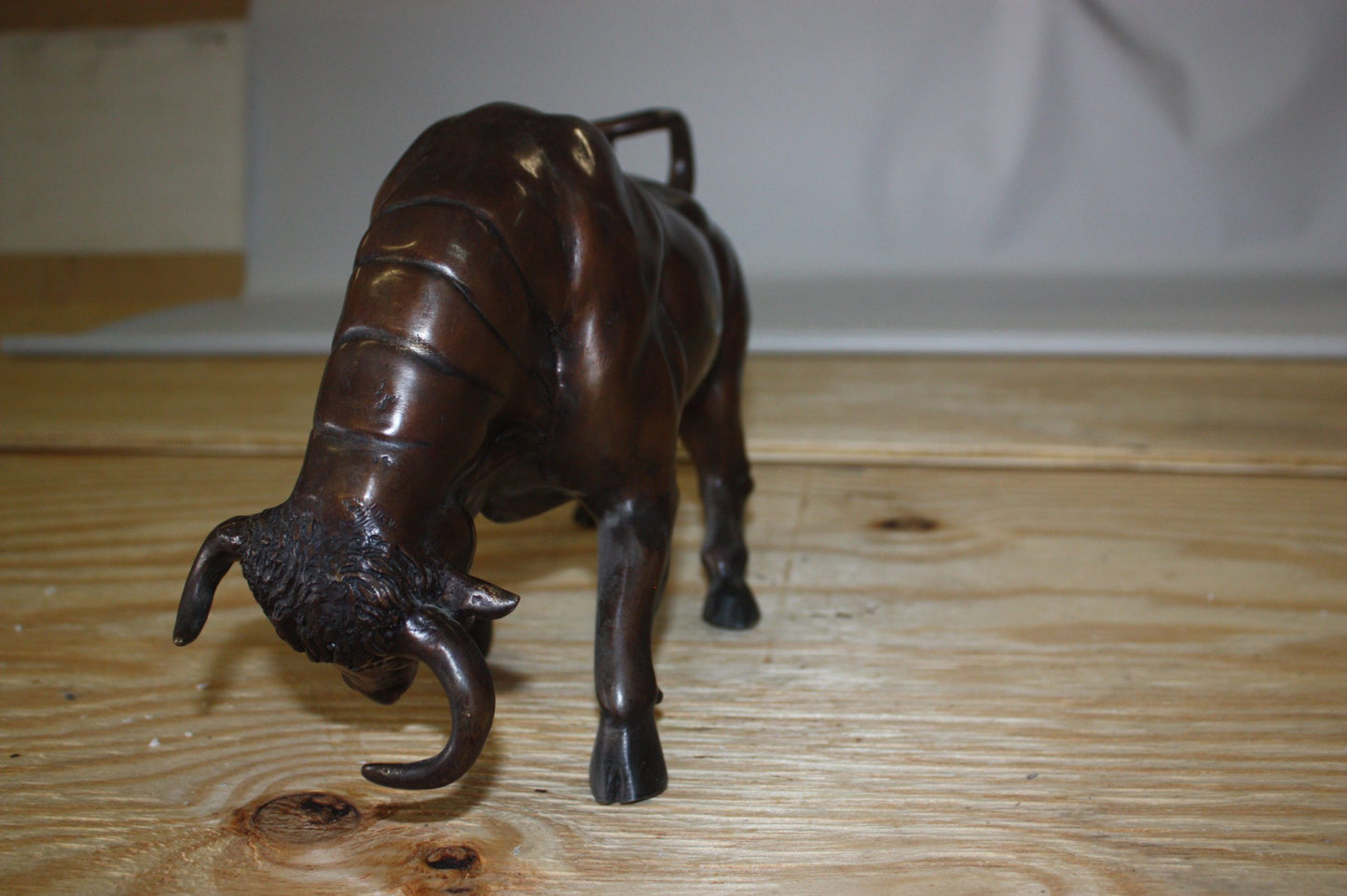 Wall street bull - small, Bronze Statue -  Size: 15"L x 4"W x 10"H. 