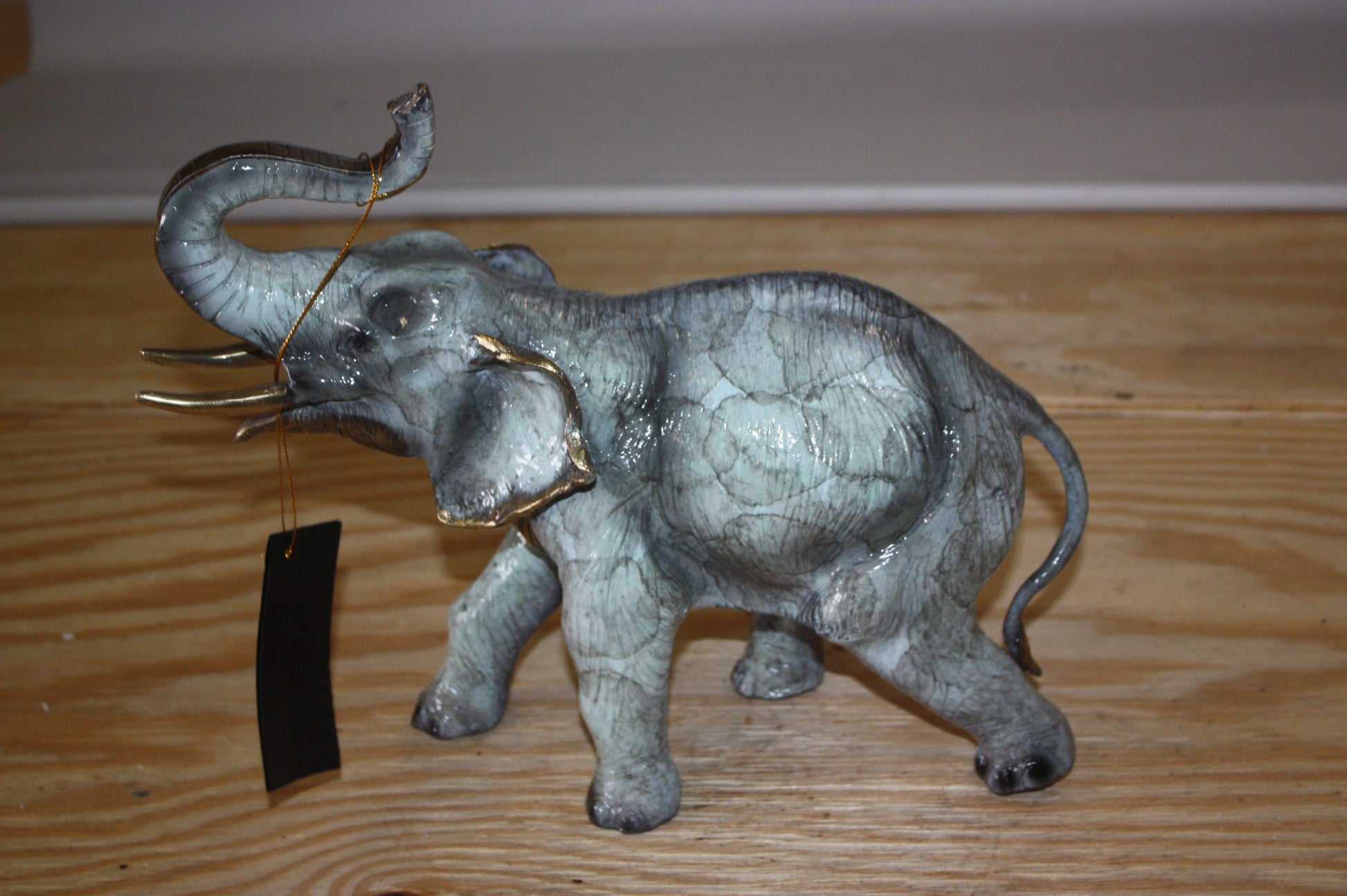 Elephant with trunk up -  Statue -  Size: 13.5"L x 5"W x 12"H. 