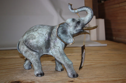Elephant with trunk up -  Statue -  Size: 13.5"L x 5"W x 12"H. 