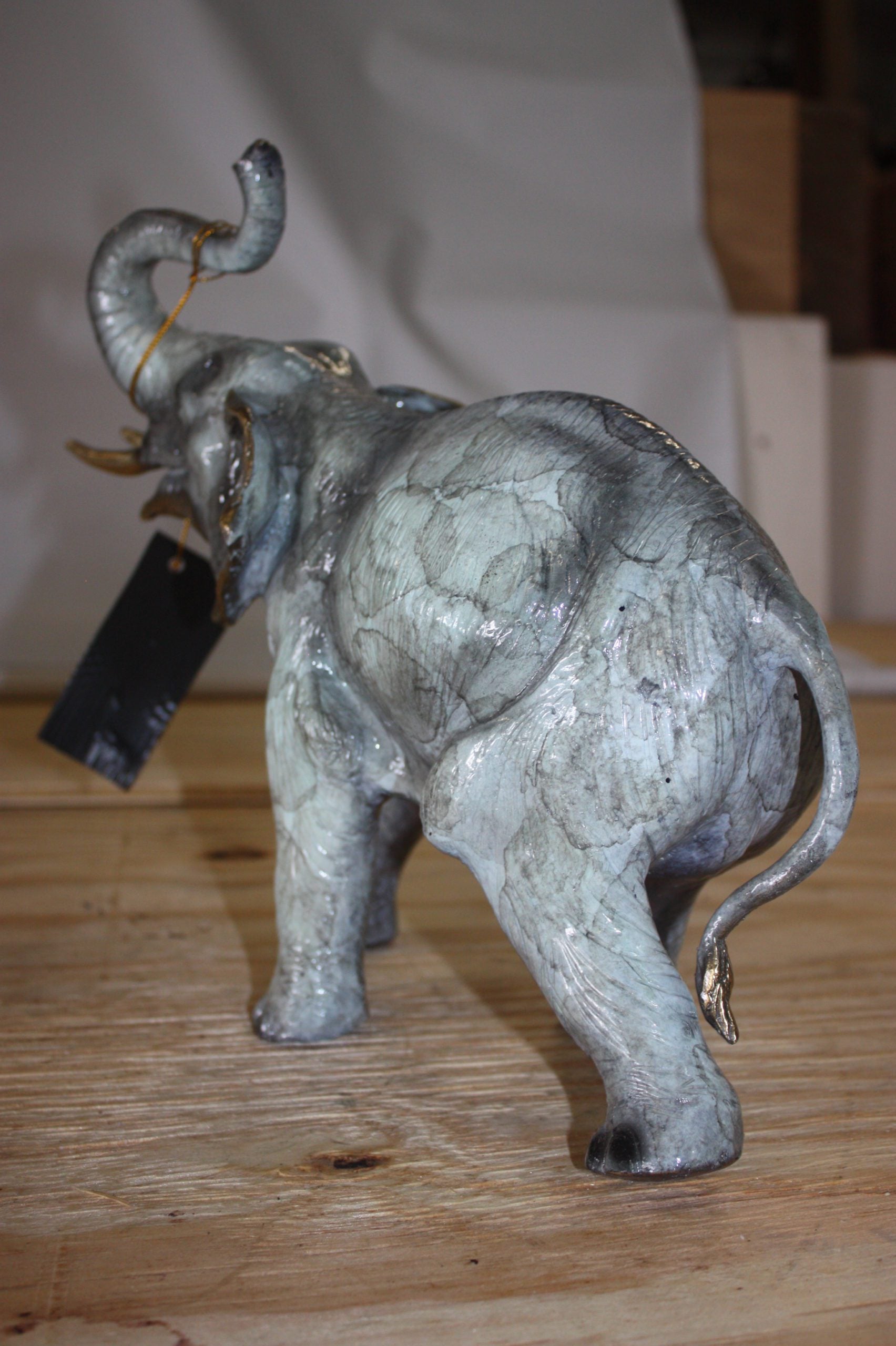 Elephant with trunk up -  Statue -  Size: 13.5"L x 5"W x 12"H. 