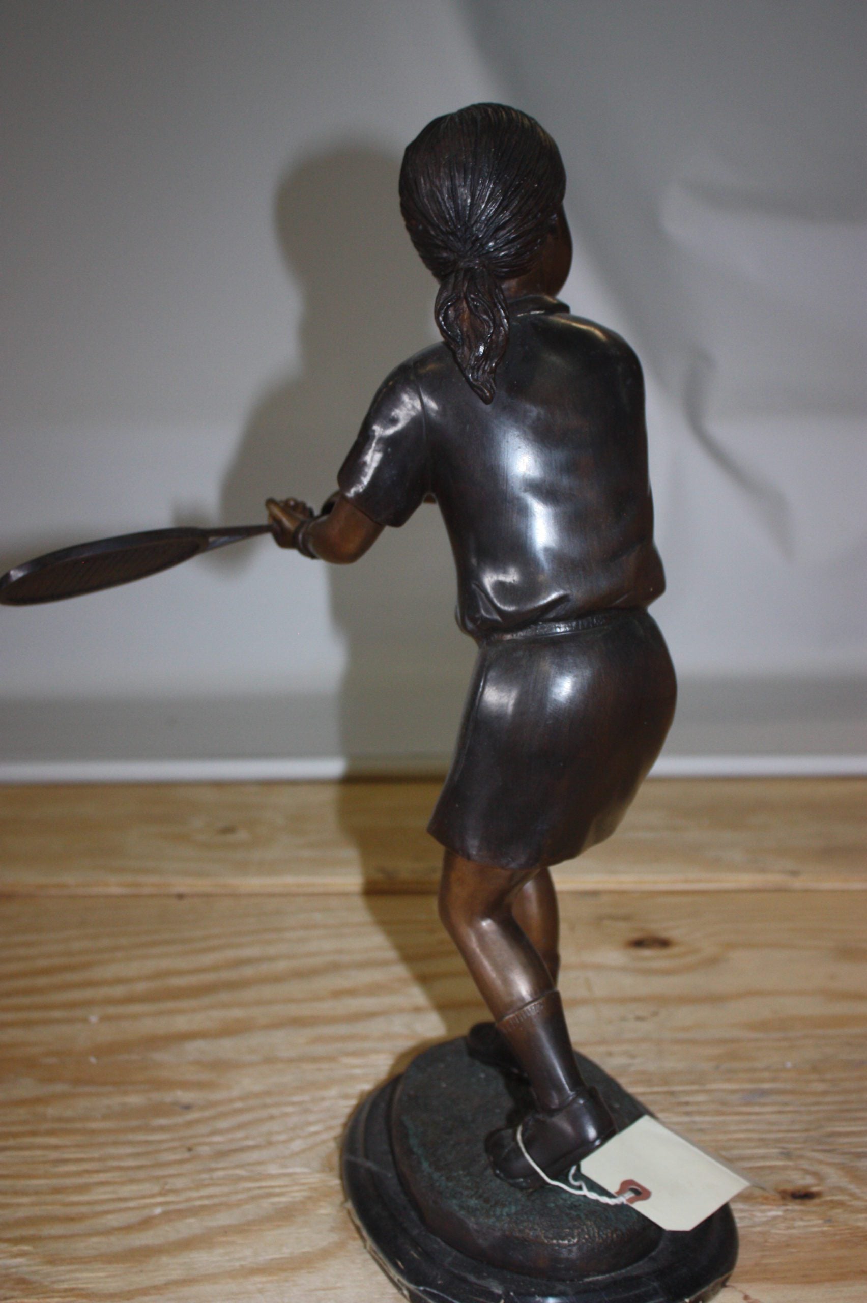 Girl Playing Tennis - Bronze Statue -  Size: 10"L x 11"W x 21"H. 
