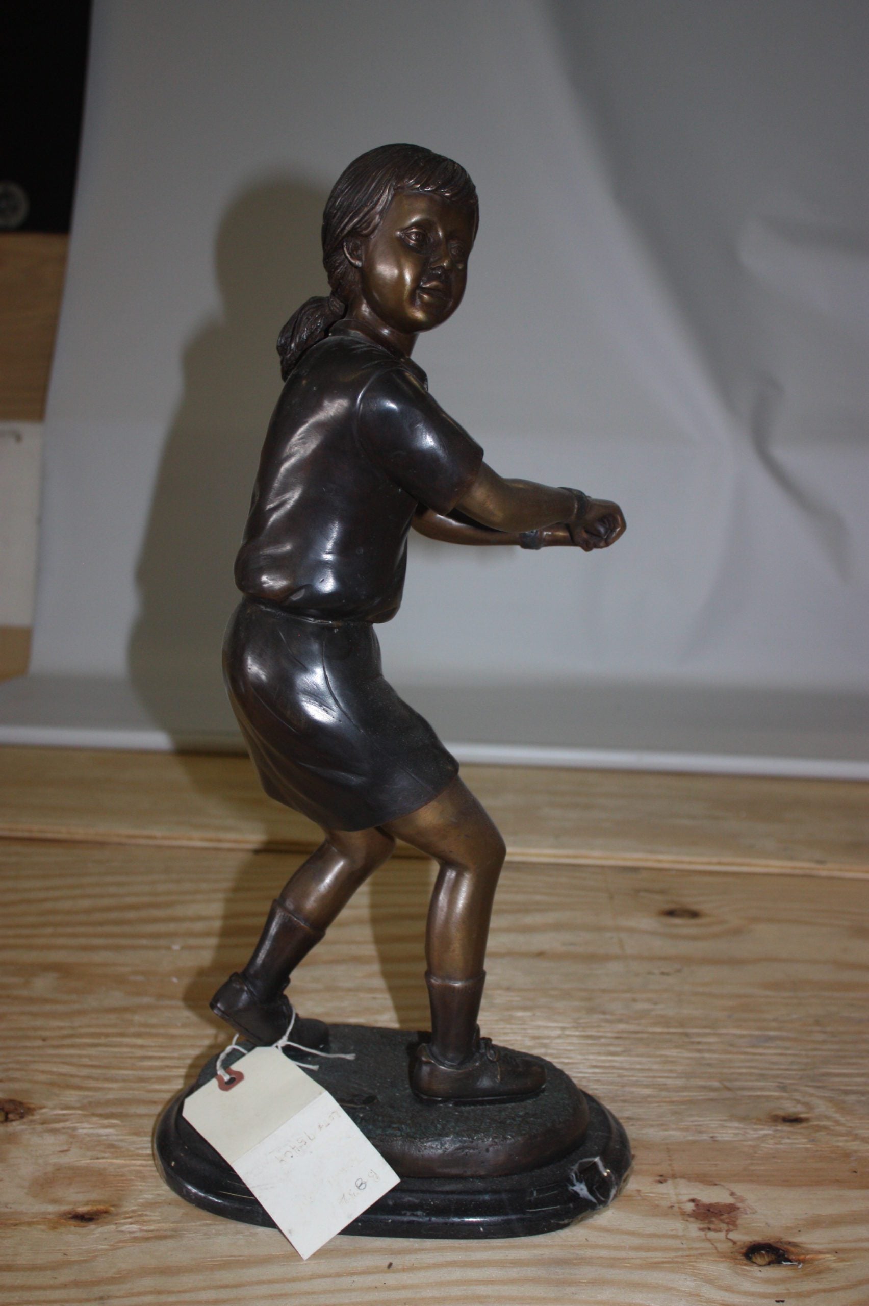 Girl Playing Tennis - Bronze Statue -  Size: 10"L x 11"W x 21"H. 