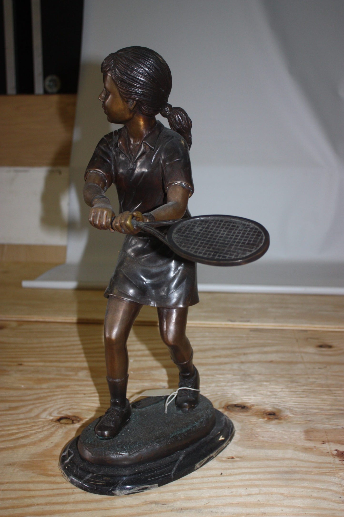 Girl Playing Tennis - Bronze Statue -  Size: 10"L x 11"W x 21"H. 
