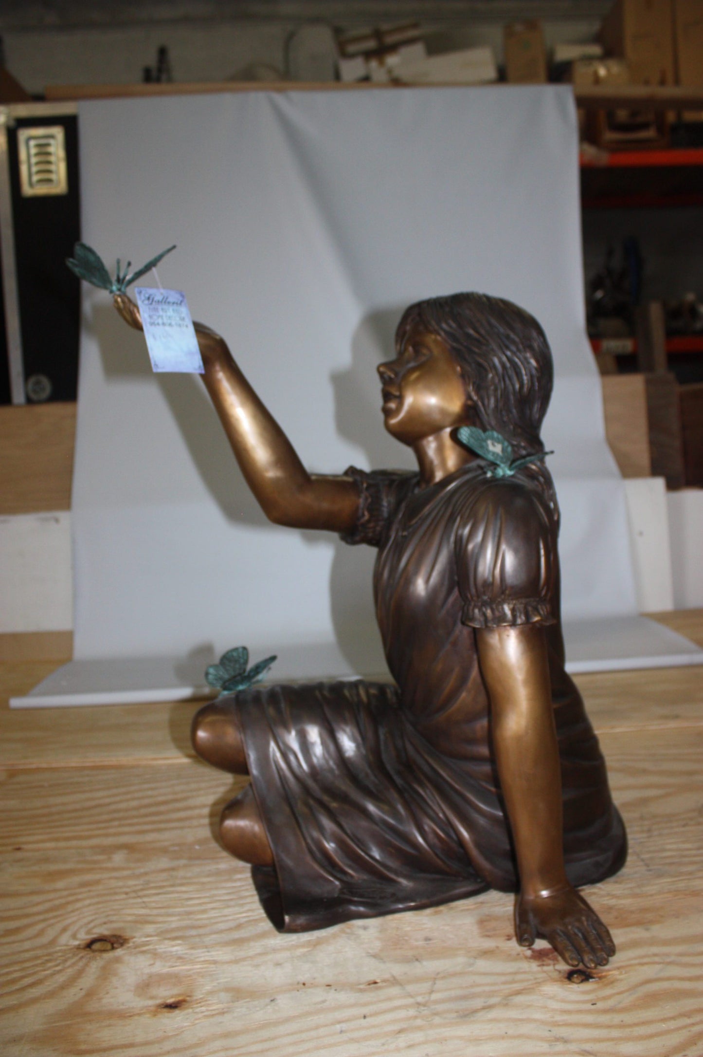 Girl with butterflies  - Bronze Statue -  Size: 27"L x 17"W x 24"H. 