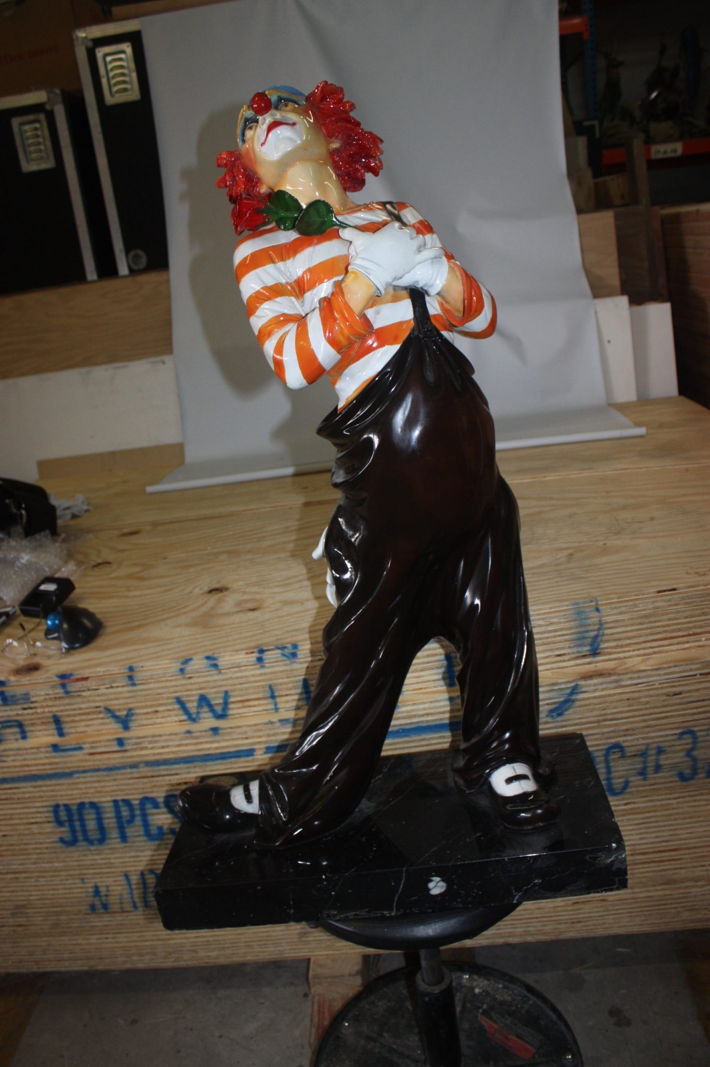 Standing clown with flowers - Bronze Statue -  Size: 21"L x 10.5"W x 38"H. 