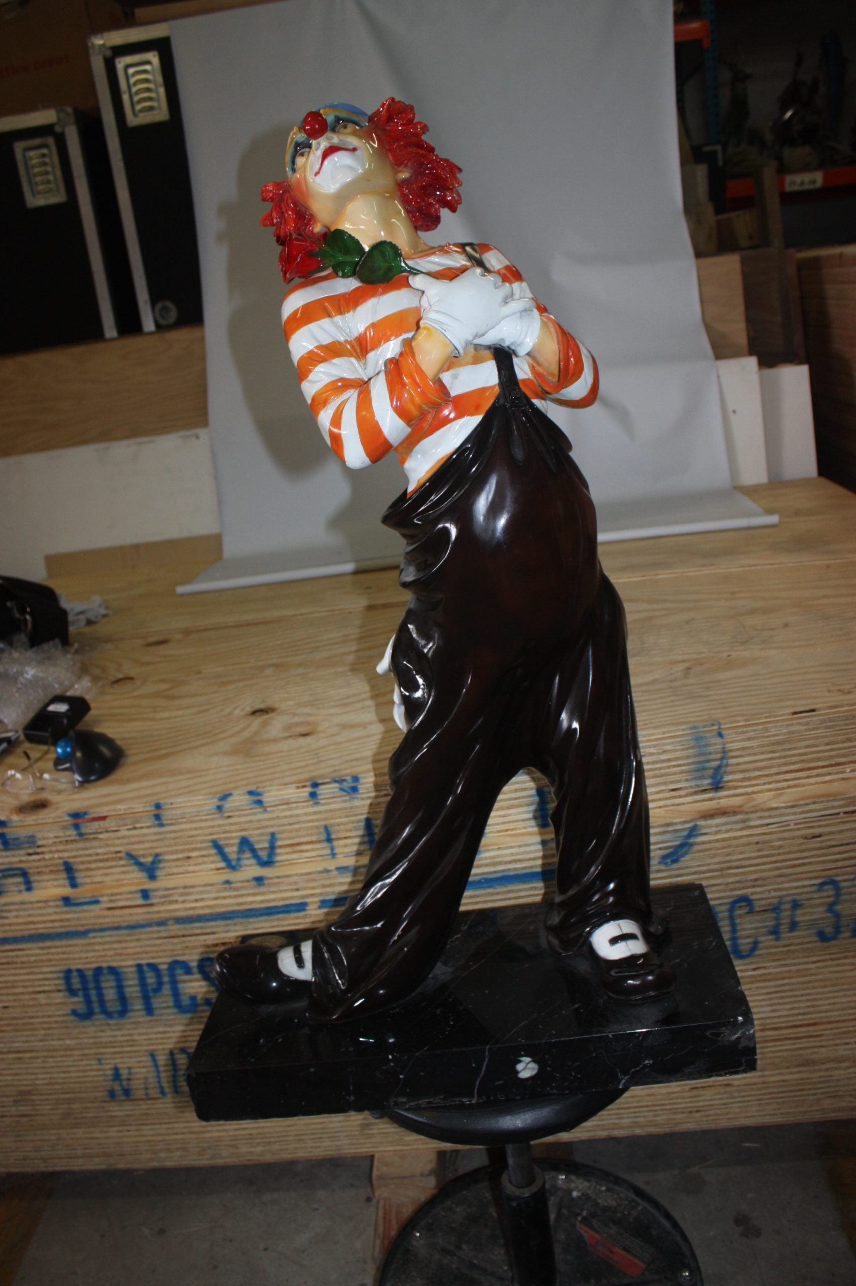 Standing clown with flowers - Bronze Statue -  Size: 21"L x 10.5"W x 38"H. 