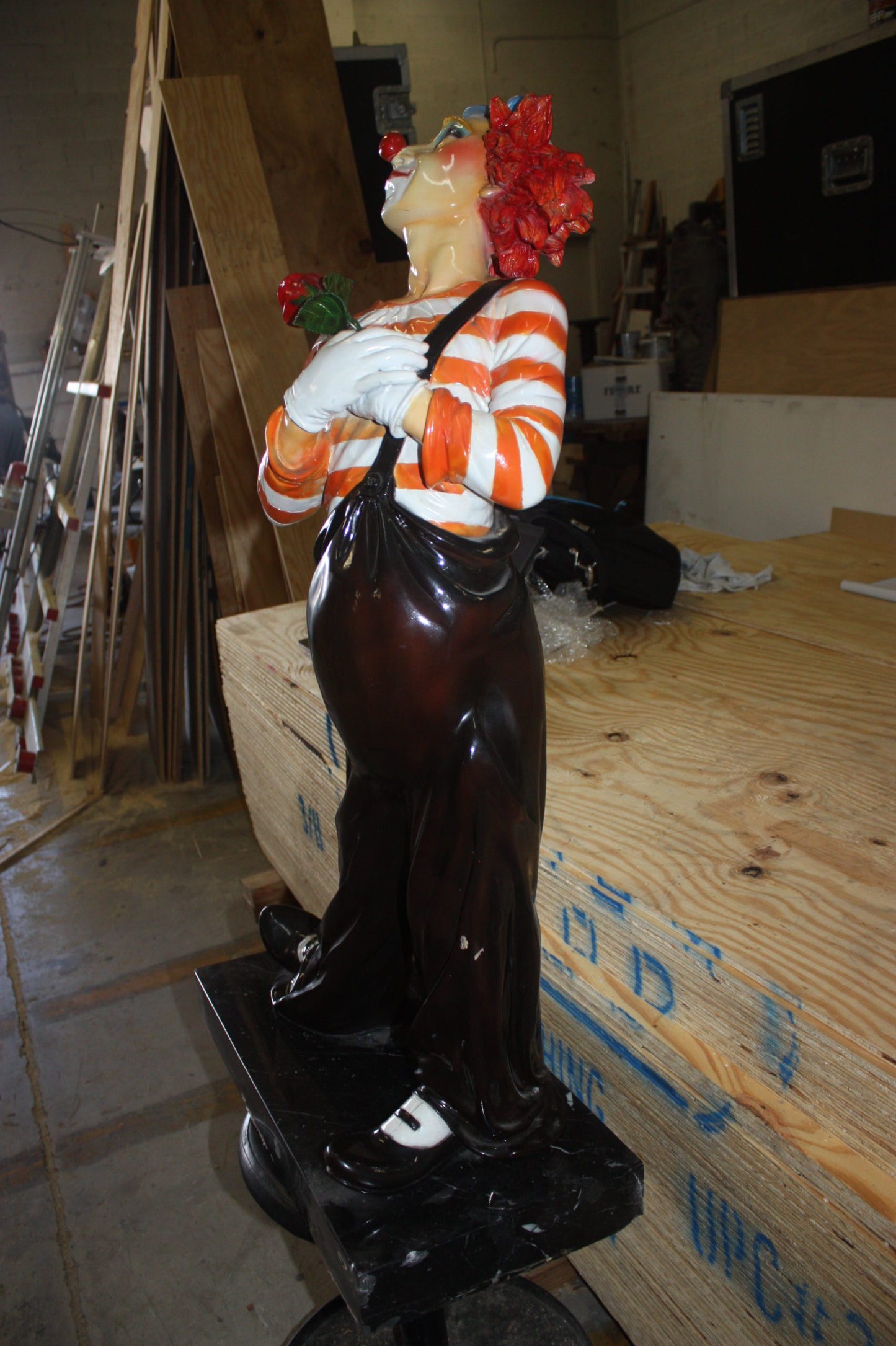 Standing clown with flowers - Bronze Statue -  Size: 21"L x 10.5"W x 38"H. 