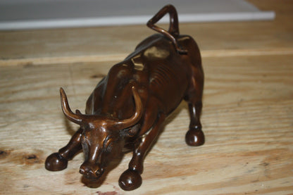 Wall street bull small - Bronze Statue -  Size: 12"L x 6"W x 7.5"H. 