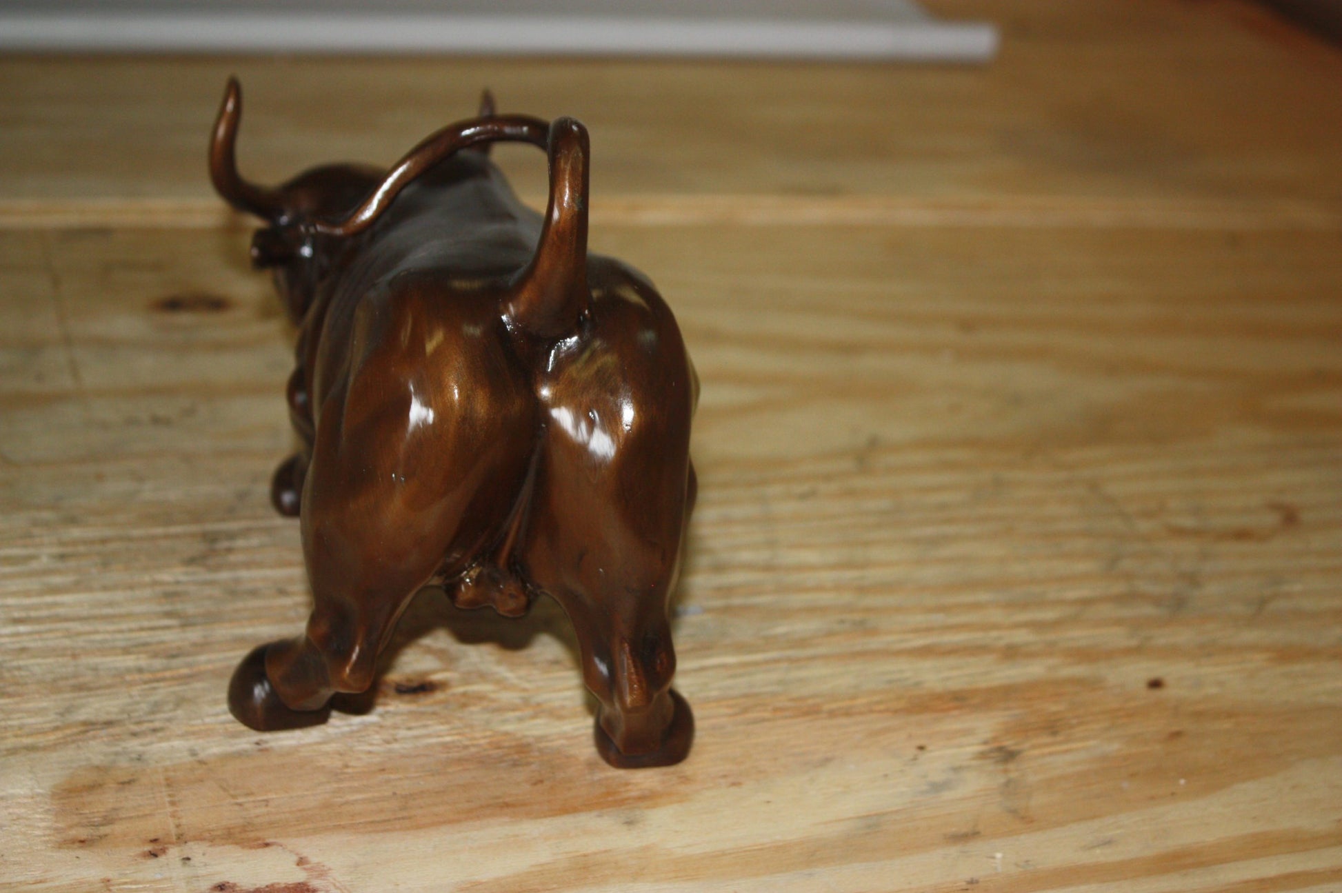 Wall street bull small - Bronze Statue -  Size: 12"L x 6"W x 7.5"H. 