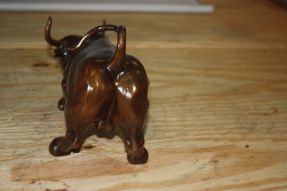 Wall street bull small - Bronze Statue -  Size: 12"L x 6"W x 7.5"H. 