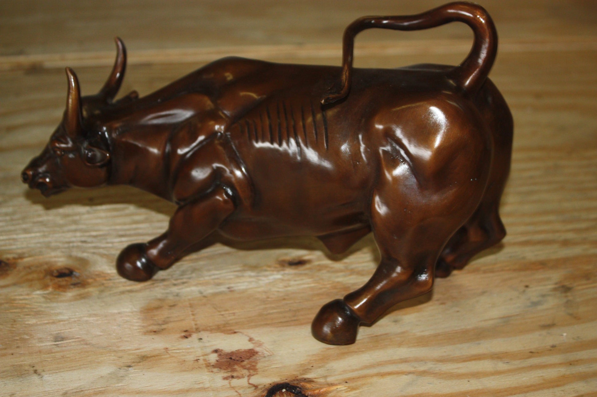 Wall street bull small - Bronze Statue -  Size: 12"L x 6"W x 7.5"H. 