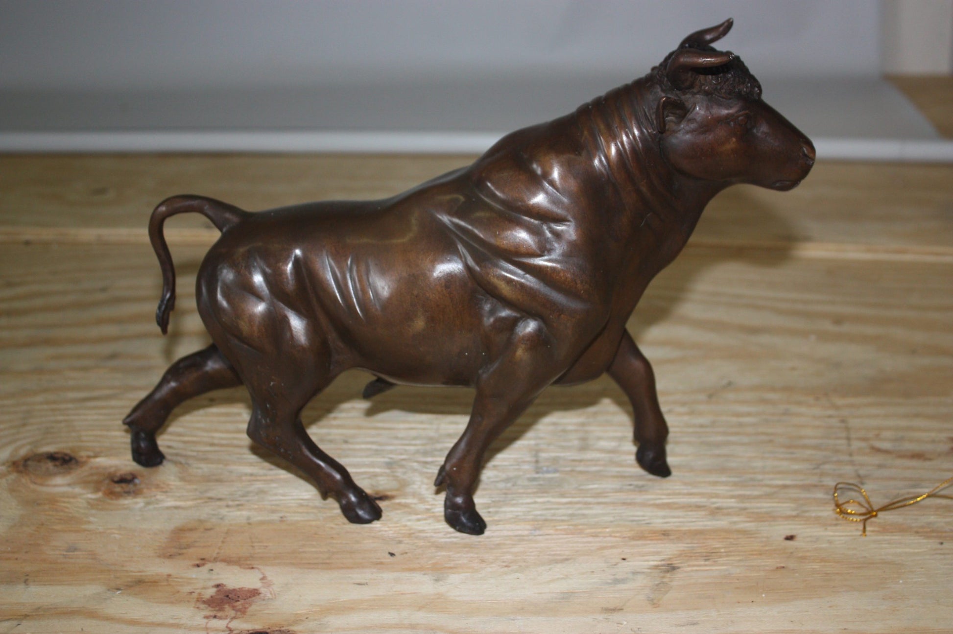 Bull Head up - Bronze Statue -  Size: 15"L x 4"W x 10"H. 