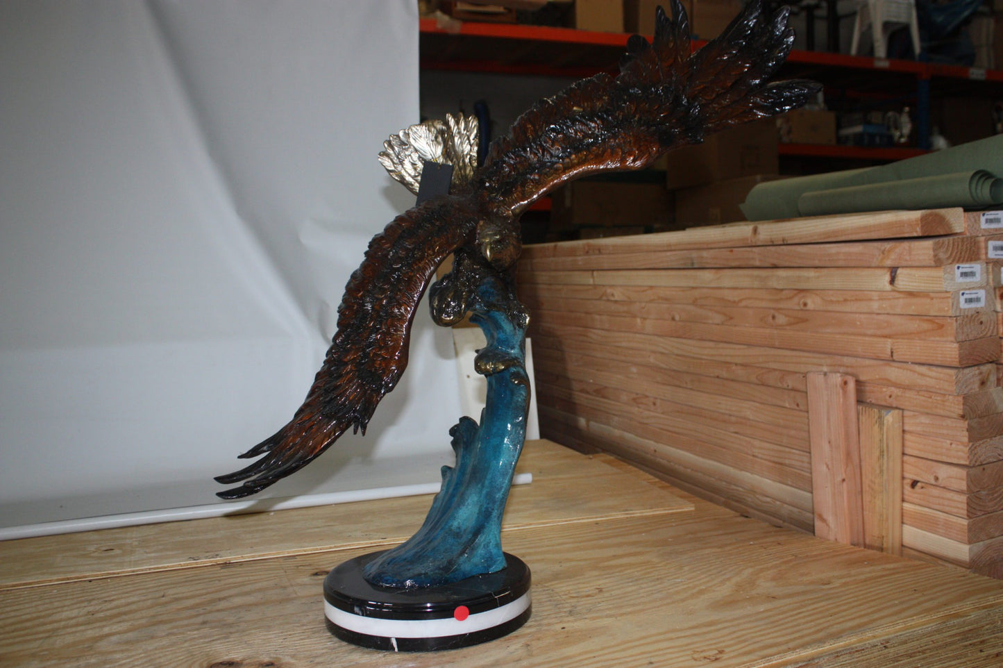 Eagle on a wave - Bronze Statue -  Size: 32"L x 12"W x 34"H. 