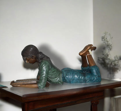 Kate Reading a Book Bronze Statue -  Size: 42"L x 18"W x 17"H.