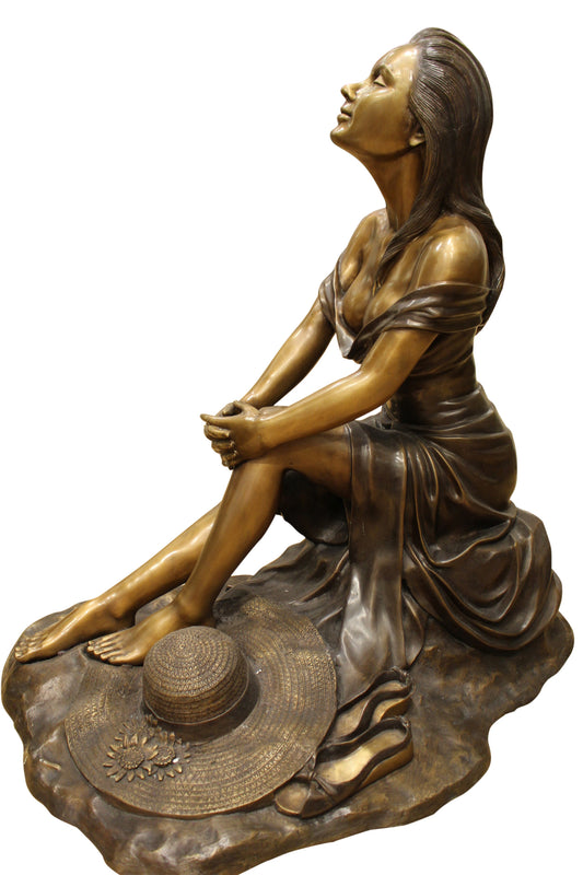 Lady on Stone Bronze Statue -  Size: 33"L x 23"W x 34"H. 