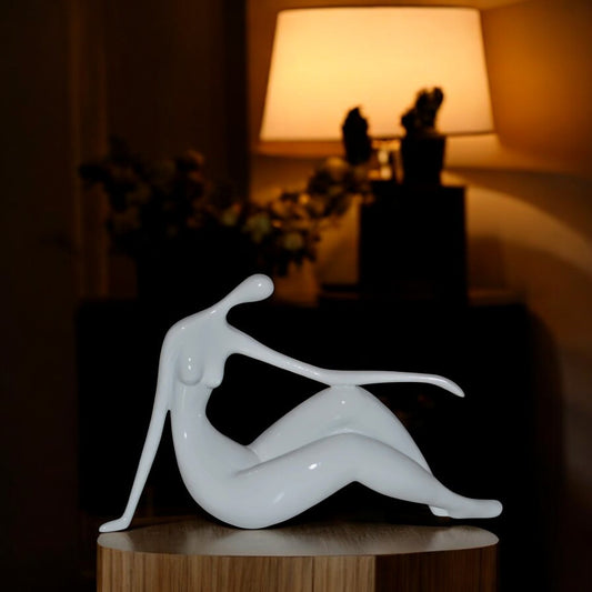Modern Art Women on the Beach White Resin Statue - Size: 28"L x 8"W x 16"H.