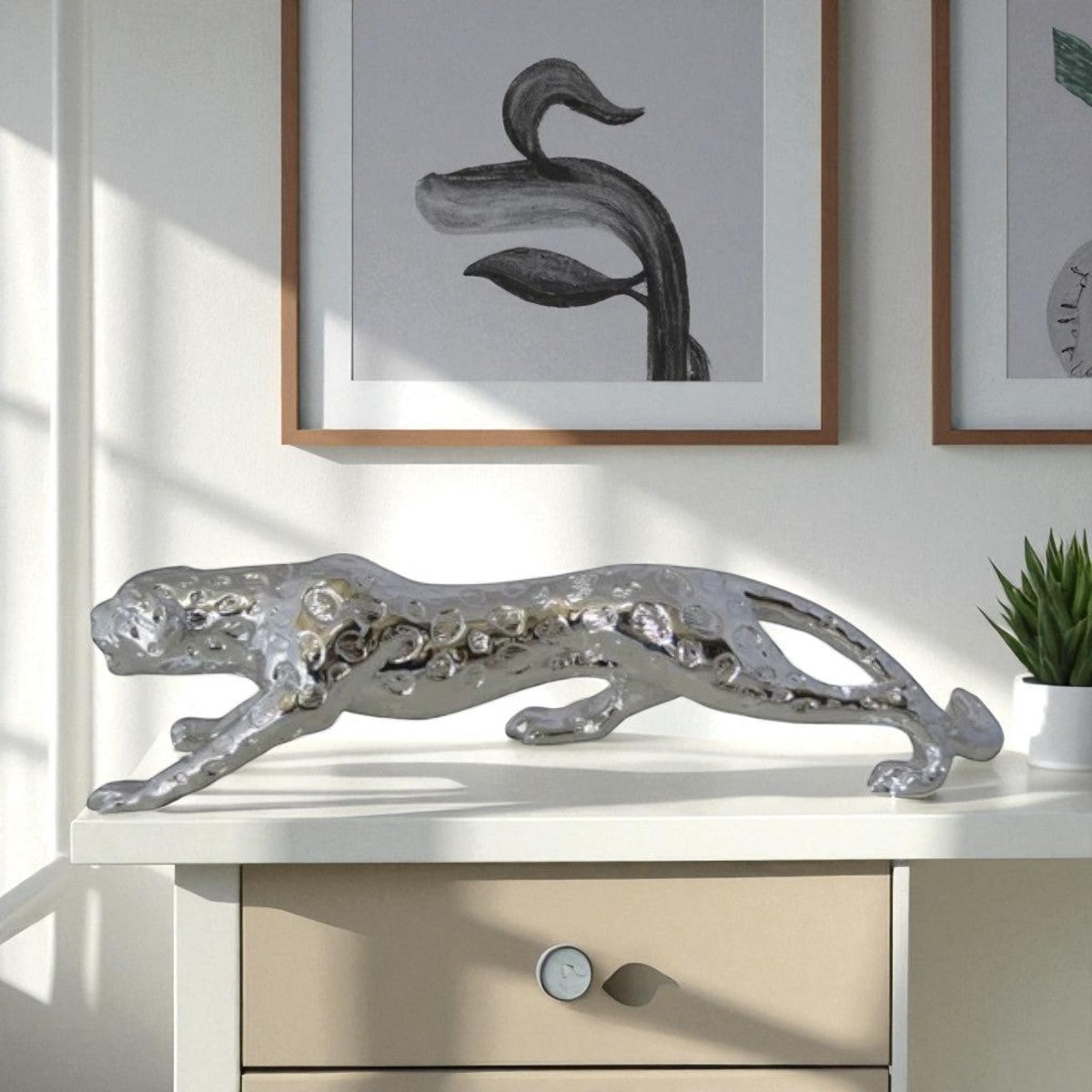 Modern Art Silver Jaguar Statue Made of Resin -  Size: 23"L x 6"W x 7"H.