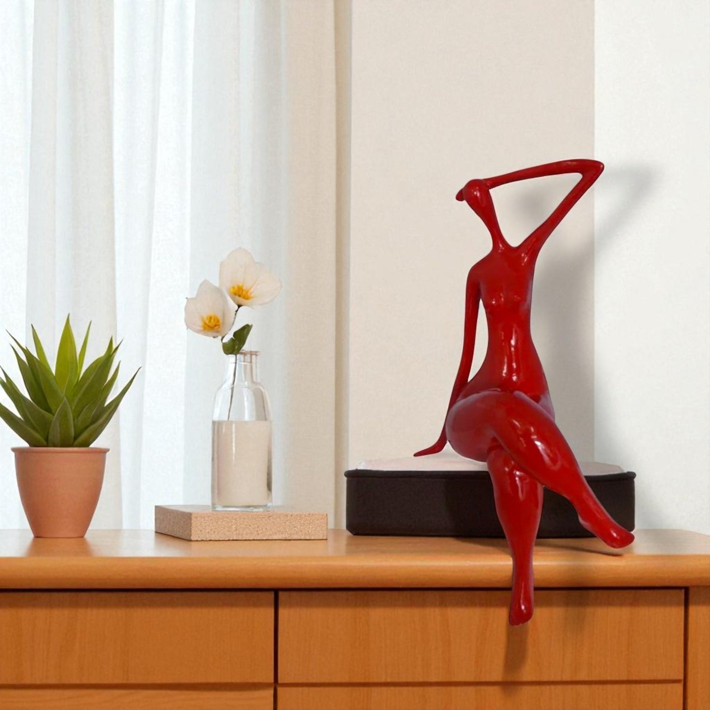 Modern Art Sitting on Edge Girl Made of Resin -  Size: 9"L x 7"W x 16"H.