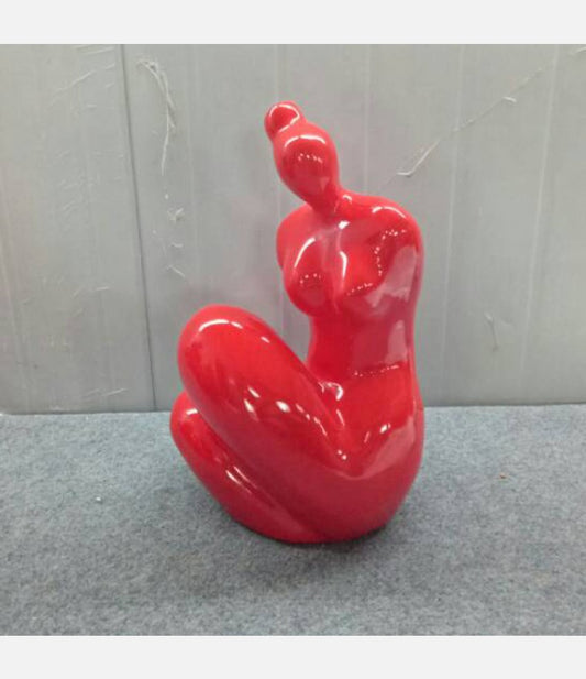 Modern Art red women sitting Made of resin -  Size: 11"L x 9"W x 16"H.