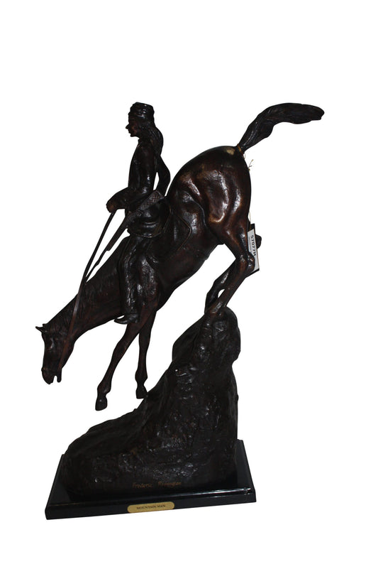 Mountain man Bronze by Fredrick Remington -  Size: 20"L x 8"W x 27"H. 
