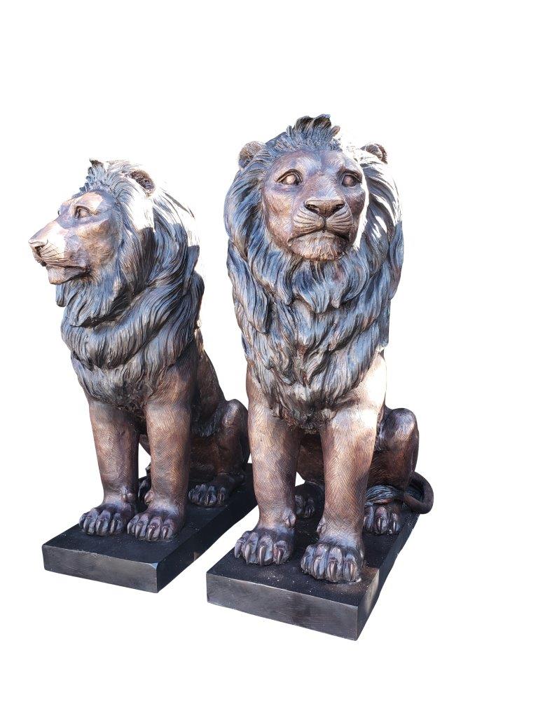 Pair of Life-size lions bronze statues -  Size: 17"L x 35"W x 47"H.