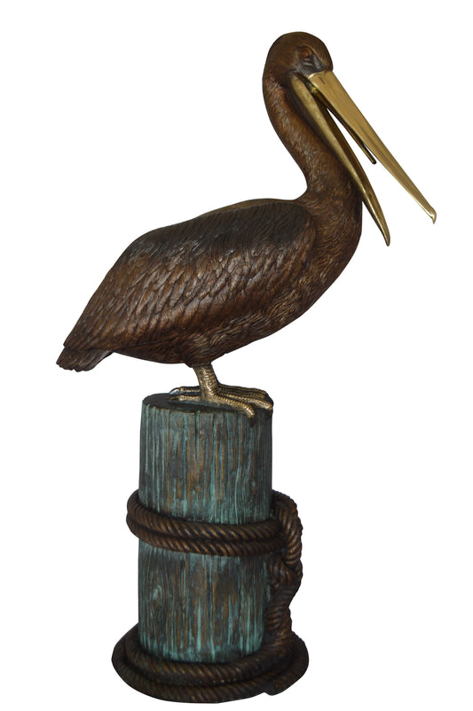 Pelican on a Stump Bronze Statue -  Size: 14"L x 38"W x 58"H. 