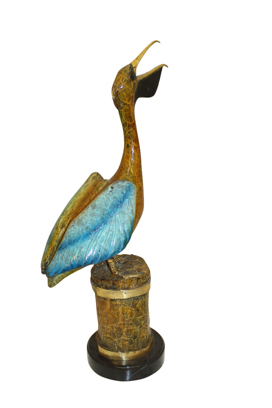 Pelican on a Tree Stump Bronze Statue -  Size: 8"L x 12"W x 27"H. 