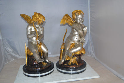 Cupid Girl On A Rock Bronze Statue  -  Size: 20"L x 15"W x 25"H. 