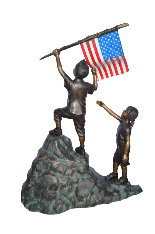 Two Kids on Rock W the American Flag Bronze Statue -  Size: 50"L x 22"W x 58"H.