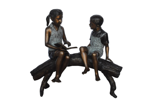 Two Kids on a tree log reading Bronze Statue Large -  Size: 44"L x 17"W x 42"H.
