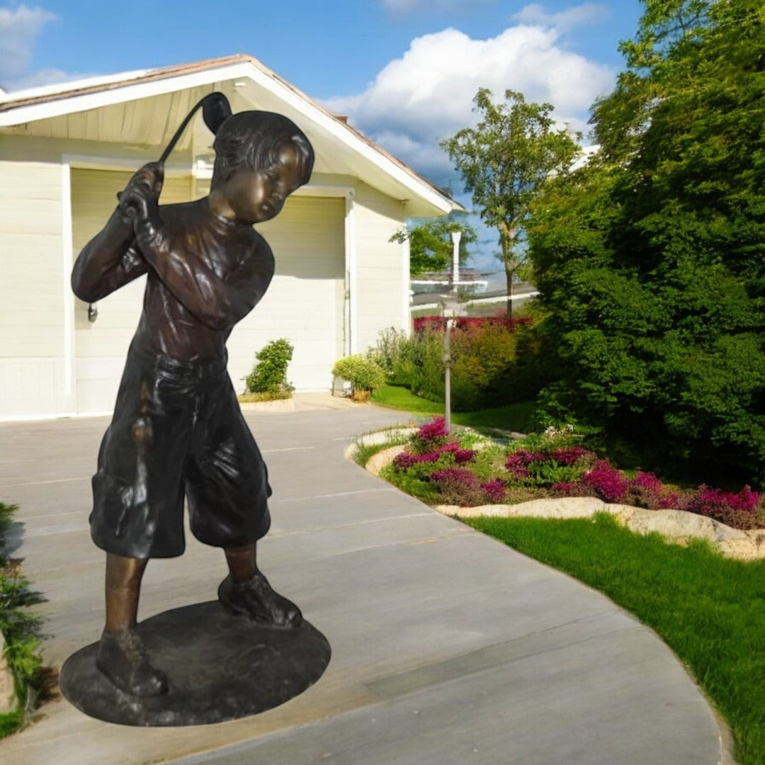 Young Boy Plays Golf Bronze Statue -  Size: 19"L x 21"W x 45"H.